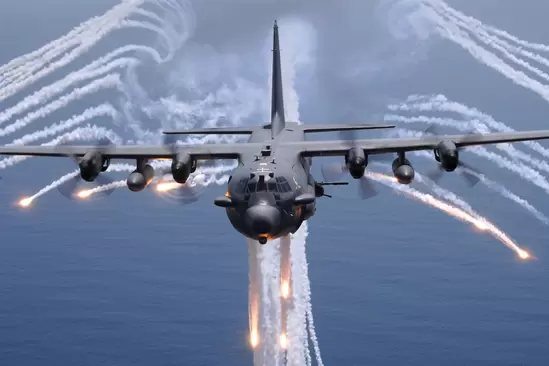 Angel of Death: AC-130 gunship firing missiles over the ocean.